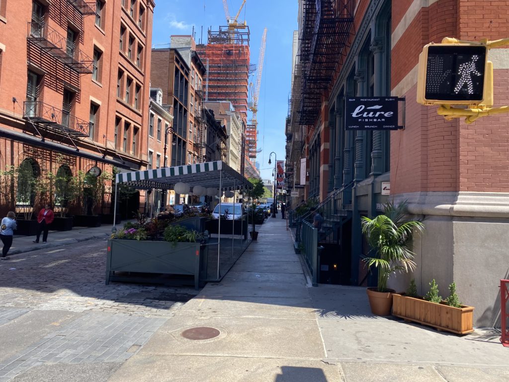 Lure Fishbar, which is participating in the NYC Open Restaurant Program, has built a seating extention in the sidewalk in front of their establishment.