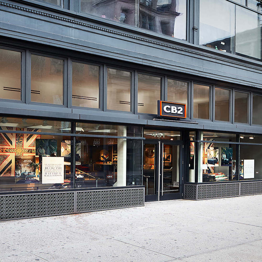 Photo of the storefront outside CB2, a modern furniture company located on Broadway in SoHo. 