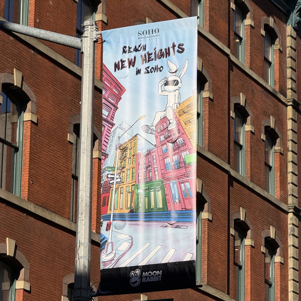 Moon Rabbit SoHo Broadway Street Banner: "Reach New Heights"