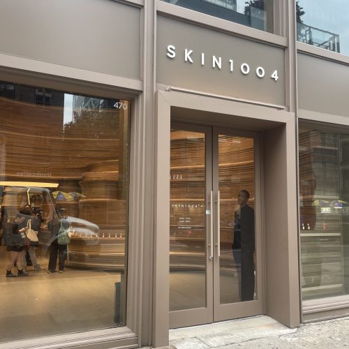 Skin1004's entryway has big windows and soft natural colors