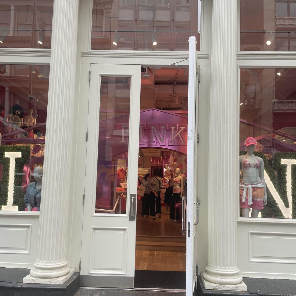 Pink's storefront, showing white columns and an open door. Through the windows, the store is in fact very pink