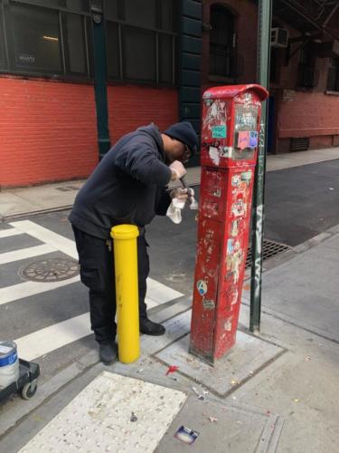 Cleaning Graffiti at the Southeast Corner of Crosby & Jersey Streets